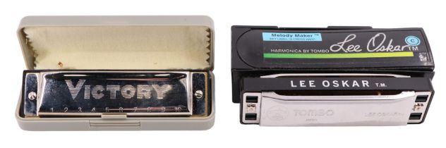 Two cased harmonicas / mouth organs, being a Lee Oskar Melody Maker and a Victory