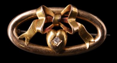 A Victorian diamond-set 15 ct gold brooch, having a 2mm eight-cut diamond set in heart surmounted by