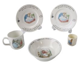 A small group of Wedgwood Beatrix Potter children's dinnerware together with a Bunnykins egg cup,