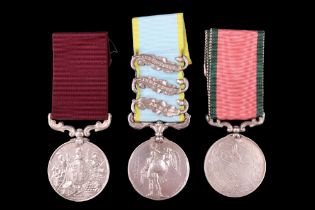 A Crimea Medal with Sebastopol, Inkermann and Alma clasps, a Turkish Crimea and Army Long Service