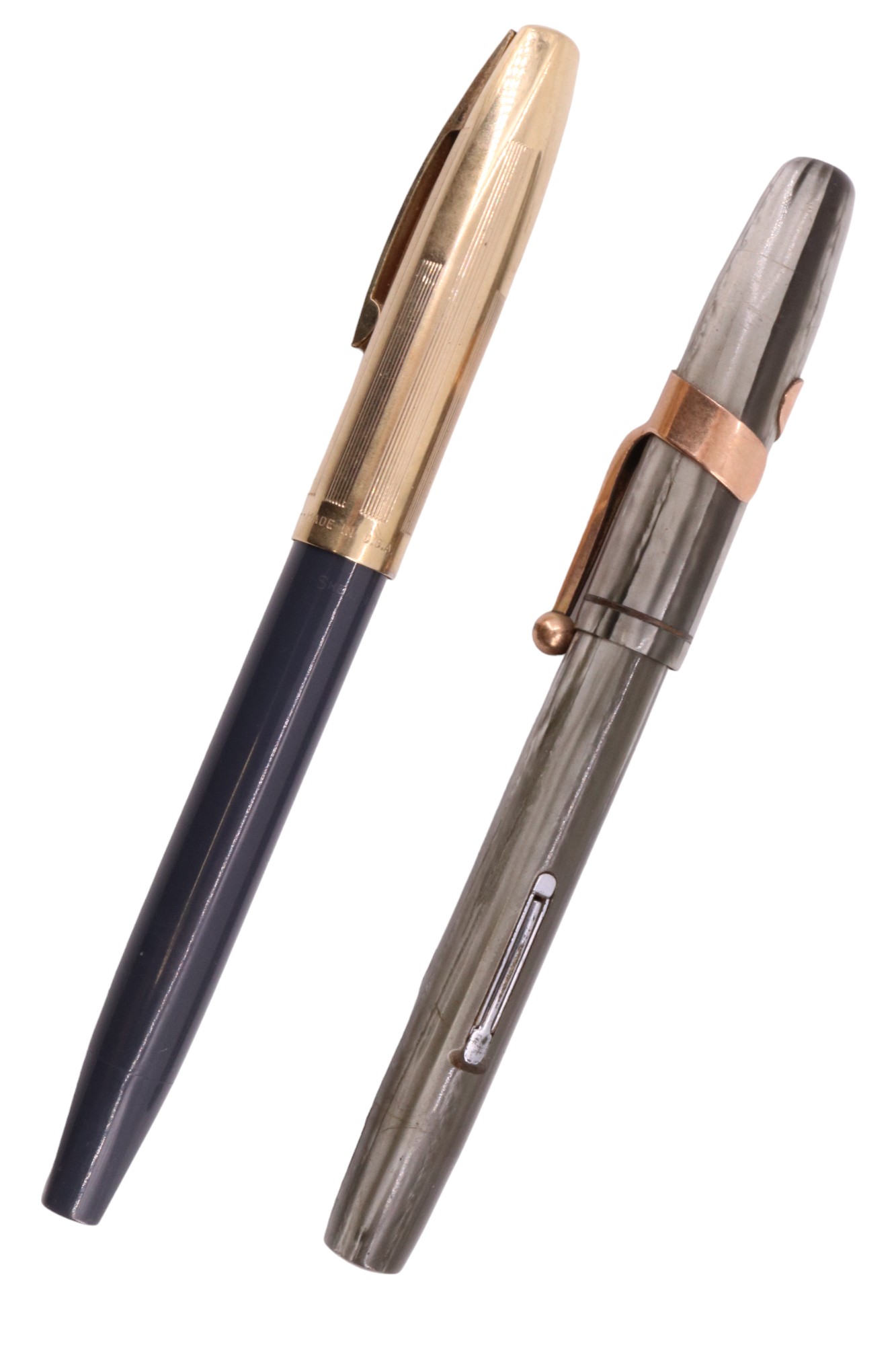 A vintage Sheaffer fountain pen with a 14 K nib, together with a similar Waterman's fountain pen