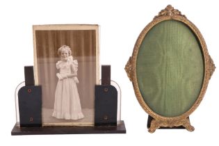 A 1930s / 40s Art Deco Lucite and Bakelite photograph frame together with an oval brass frame,