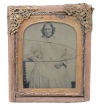 A Victorian ambrotype with gilt highlights depicting an older lady, in gilt slip and wooden frame, 9