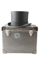 A top hat retailed by Lock & Co Hatters of St James Street, London