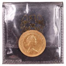 A 1976 gold sovereign coin