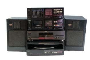 A Toshiba Hi-Fi system comprising a V10 tape deck, V10 digital synthesizer tuner amplifier,