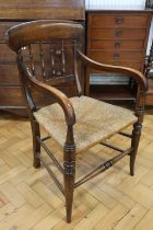 A Victorian ruch-seated beech spindle-back armchair, 89 cm