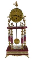 A late 20th Century Italian Alfa kitsch ceramic and gilt metal pendulum clock, height 49 cm, key