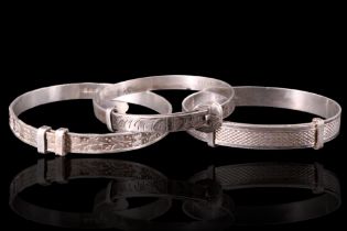 Three children's bangles in silver and white metal, 17 g