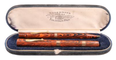 A cased vintage Waterman Clip Cap fountain pen and propelling pencil duo, both with 9 ct gold