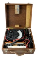A 1980s Avo Model 8 Universal Avometer in fitted wooden case with instruction booklet and