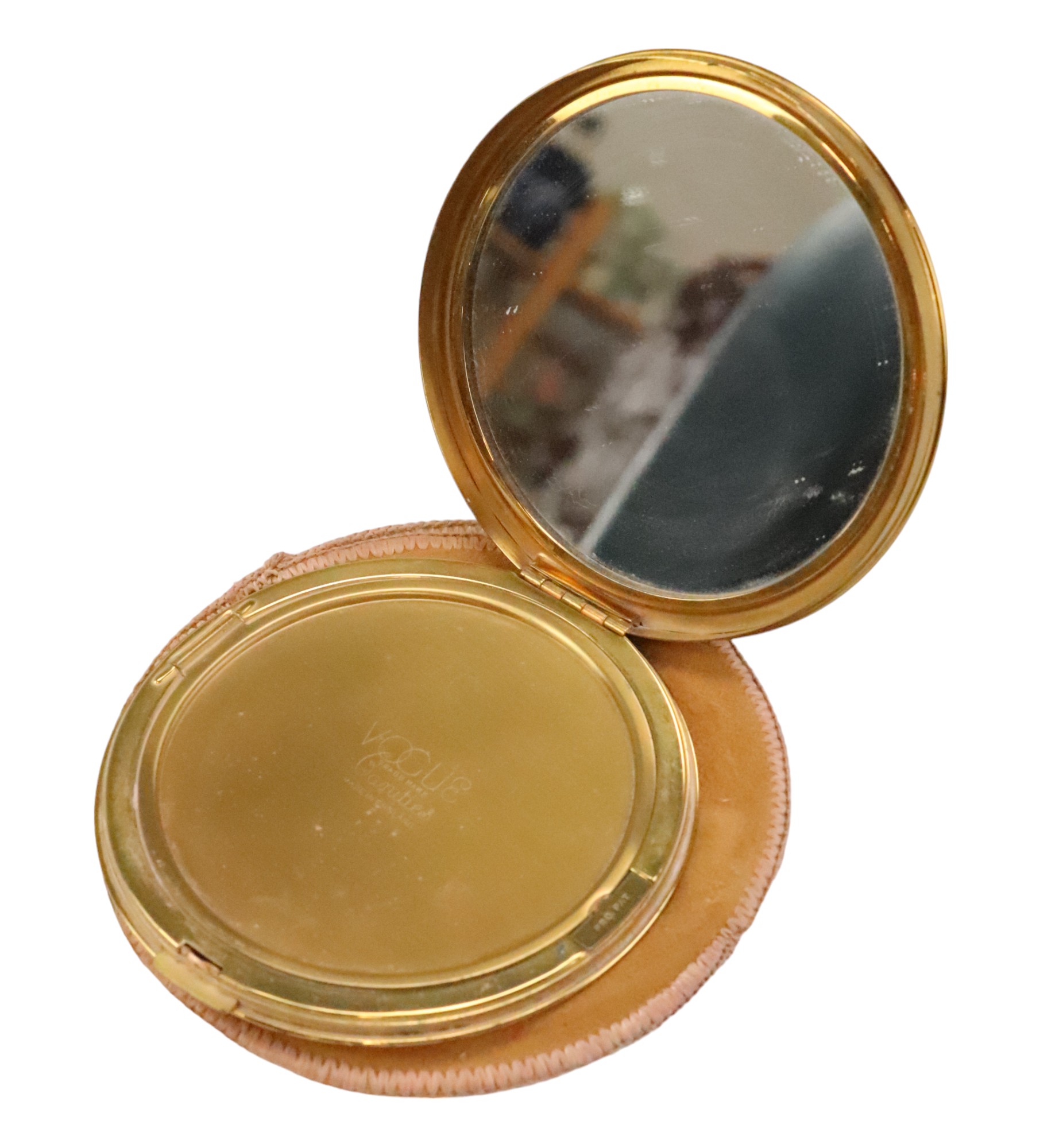 A mid 20th Century Vogue Vanities powder compact