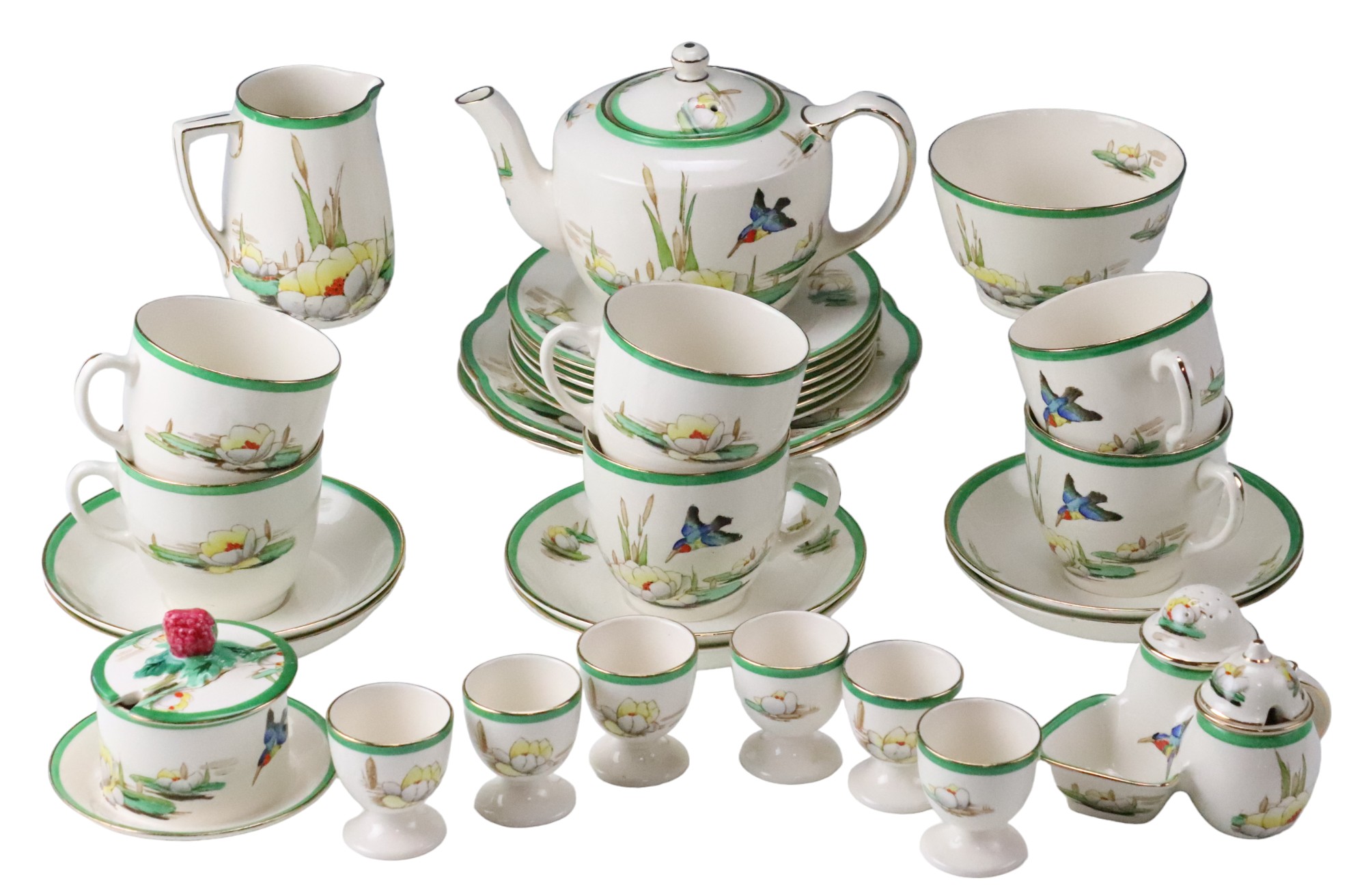 A hand-decorated Losol Ware Water Lily tea and breakfast set including egg cups, a cruet set,
