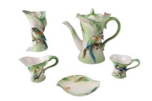 A Franz Amazon Rainforest Parrot pattern porcelain coffee set and candlestick, hand painted and