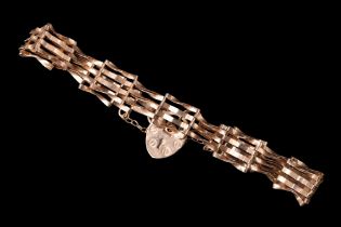 A 9 ct gold gate-link bracelet, Sheffield, 1991, 3.83 g, 8.5 mm wide, 17.5 cm excluding padlock