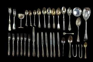 A Victorian silver fiddle pattern teaspoon together with a George V silver handled spoon and a