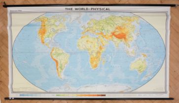 A large cloth backed educational world map by Georg Westermann, mounted on wooden poles, 249 cm x