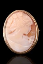 A shell cameo brooch, bezel set in 9 ct gold, London, 1985, 4.79 g, 32.5 x 26 mm
