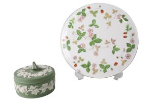 A boxed Wedgwood Wild Strawberry cake plate together with a green Jasperware lidded circular box,