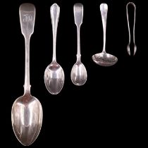 A Victorian silver table spoon, an Edinburgh silver sifting spoon, two further silver spoons and