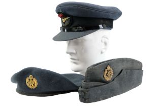 An RAF officer's peaked cap together with a beret and side hat