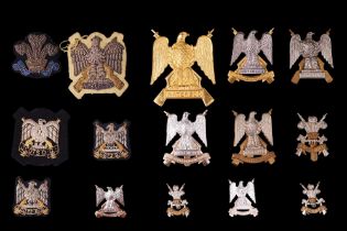 A collection of Royal Scots Dragoon Guards cap and other badges