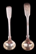Two George III silver Fiddle pattern salt spoons, each bearing an engraved armorial crest,