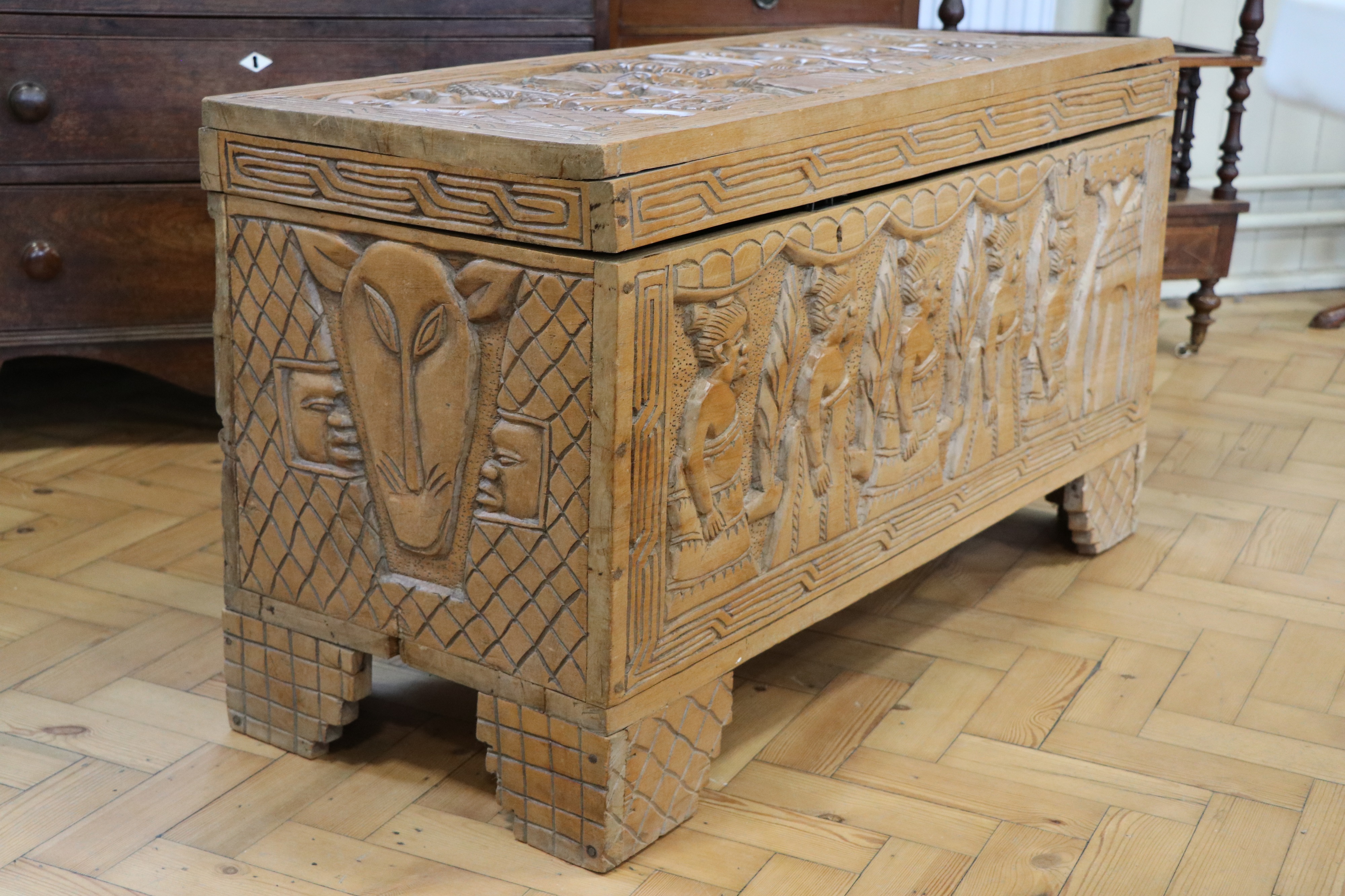 A mid-20th Century Nigerian carved hardwood chest, 103 cm x 42 cm x 56 cm - Image 3 of 5