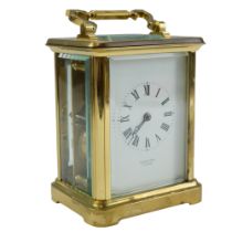 A carriage clock by Oclee & Son of Folkstone, the two-train movement striking the hours on a bell,