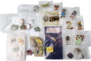 A small group of vintage lapel badges including Winnie-the-Pooh, Wacky Races, etc