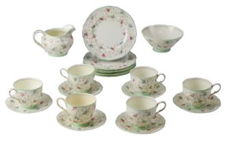 A 1930s Paragon tea set for six having transfer-printed and hand painted floral decoration