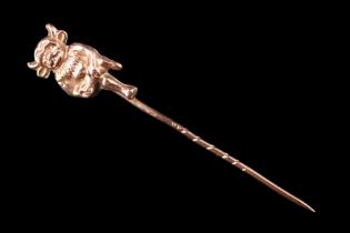 A vintage 9 ct yellow metal Lincoln Imp stick pin, marked '9ct', 0.84 g, imp figure 17 x 9 mm