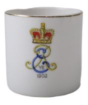 A 1902 King Edward Vll coffee can with lithophane base, height 7 cm