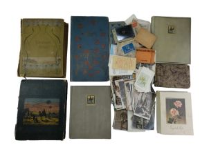 A collection of Victorian and later postcards including landscapes, Christmas subjects, portraits,