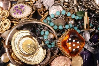A quantity of Victorian and later costume jewellery including a Victorian jet boss brooch, a 1930s
