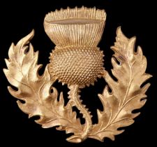 A large brass thistle-form pouch or similar badge, 8 cm x 8.5 cm