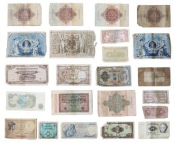 A group of world banknotes including Reichsbanknotes, Armed Forced Special Vouchers, Japanese
