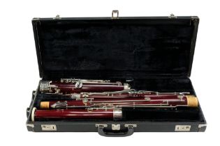 A vintage Boosey & Hawkes Emperor four-piece bassoon in fitted hard shell case