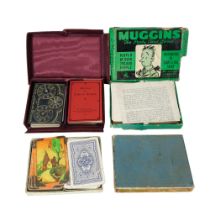 A small group of vintage card games including Bézique, Muggins, etc