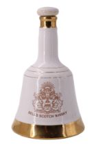 A Wade 1982 royal commemorative ceramic decanter of Bell's Scotch Whisky, 50 cl