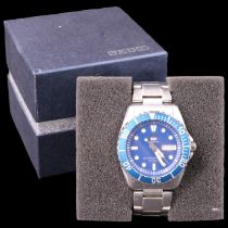 A boxed Seiko 5 Sports stainless steel wristwatch, having an automatic 23-jewel movement, blue