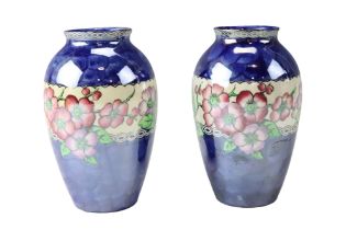 A pair of mid-to-late 20th Century floral decorated Maling vases, height 16 cm