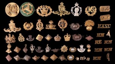 Sundry British military cap and collar badges, shoulder and rank insignia etc, including Durham