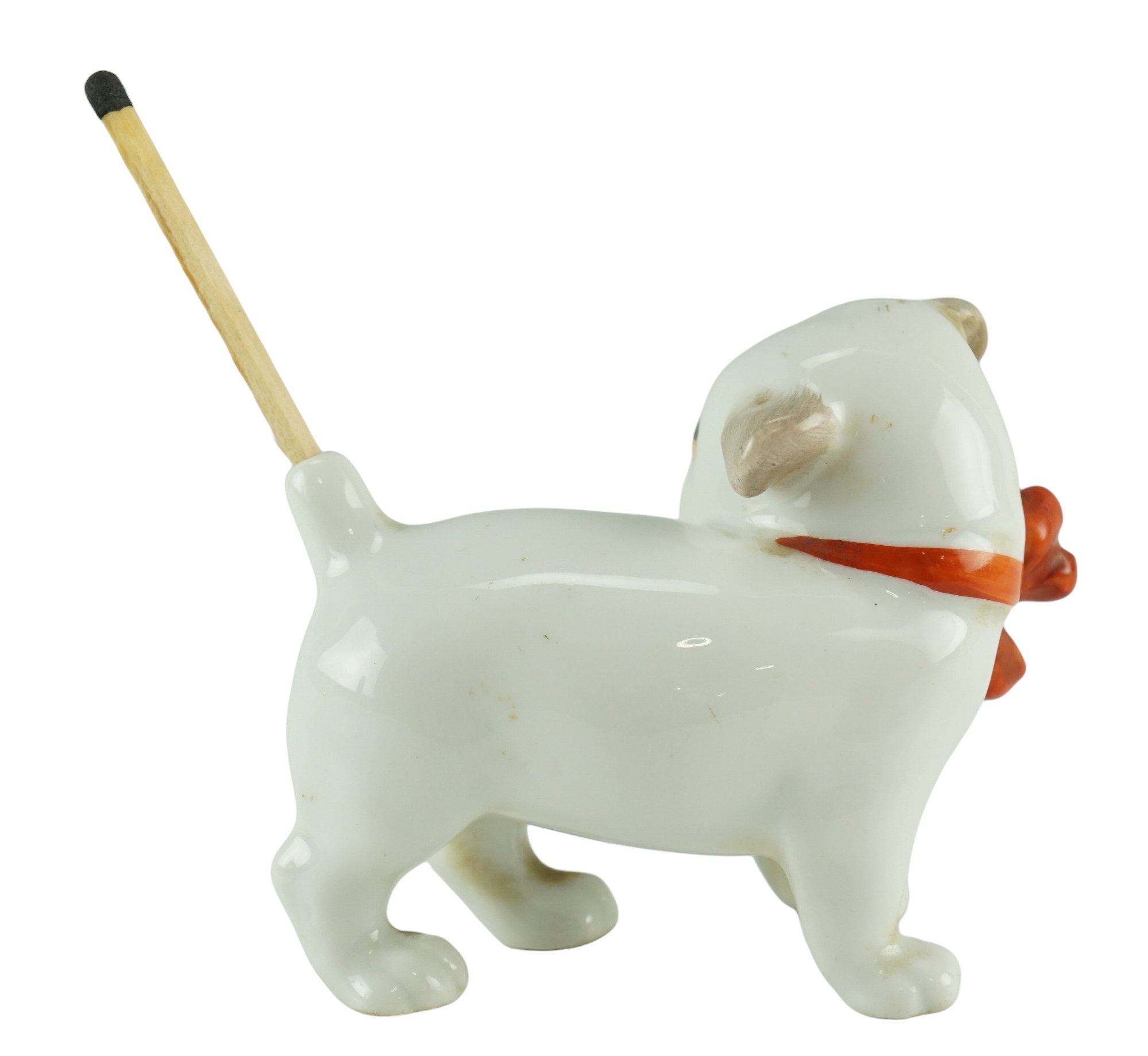 An early 20th Century Pfeffer Porcelain go-to-bed or similar dog figurine, 7.5 x 6 cm - Image 2 of 3