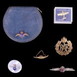 A group of RAF sweetheart brooches and badges together with a powder compact and a gold-plated