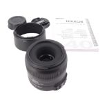 A Nikon AF-S Macro Nikkor 40mm 1:2.8 G camera lens