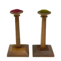 A pair of oak hat stands, of tapering square section with truncated conical bases, circa 1920s, 23