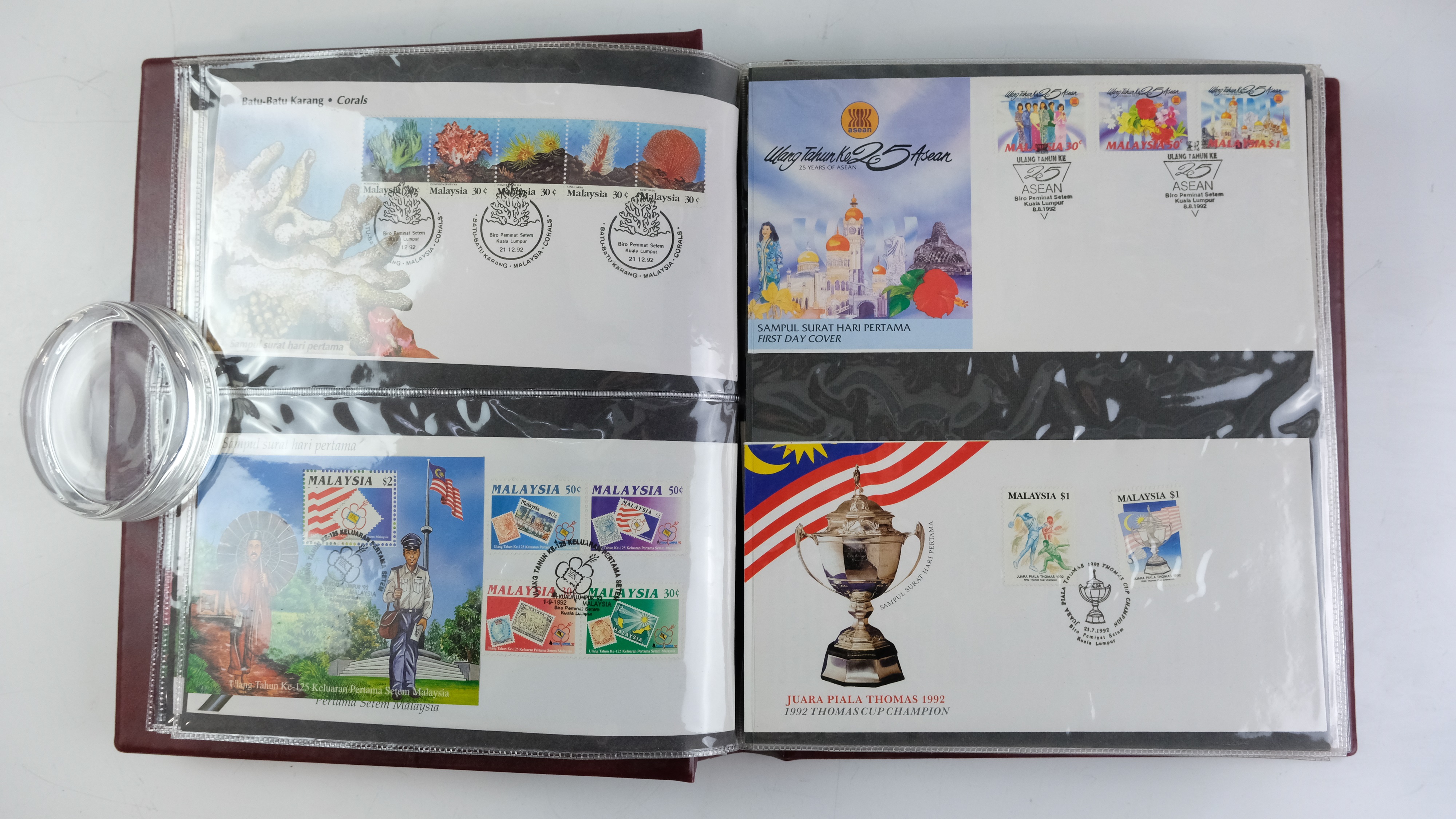 A large quantity of albums containing various world stamp covers including royal commemoratives, - Image 133 of 154