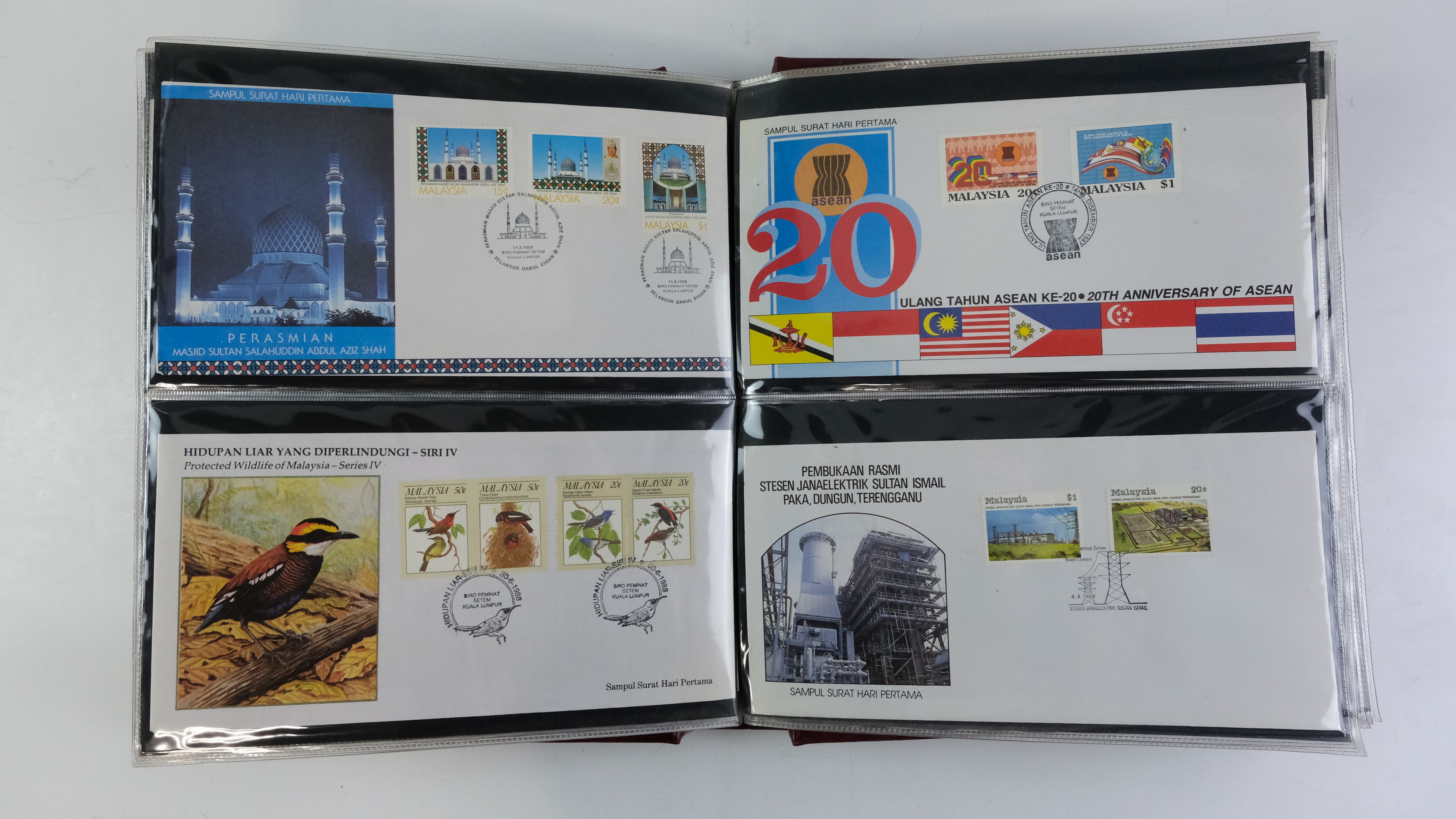 A large quantity of albums containing various world stamp covers including royal commemoratives, - Image 138 of 154