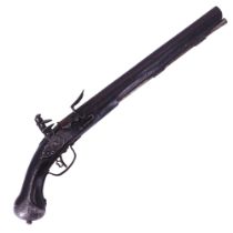 An 18th Century European flintlock holster pistol, having a 31 cm round barrel of approx 28 bore,